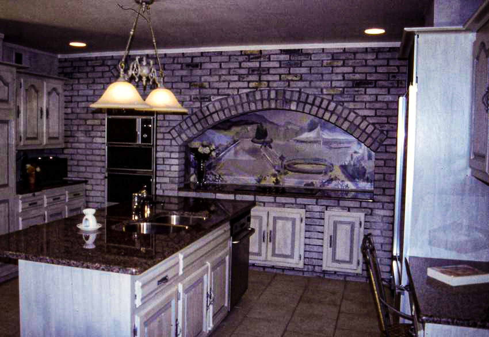 Gray Washed Bricks, Redone Cabinets and Mural